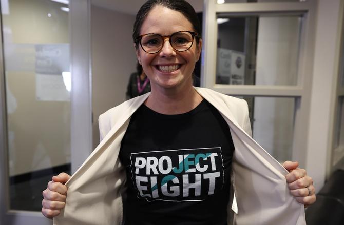 Canadian Soccer player Diana Matheson shows off her shirt promoting Project 8, an eight team professional women's soccer league in Canada at the inaugural Professional Women's Hockey League (PWHL) Draft at CBC's headquarters in Toronto. September 18, 2023.