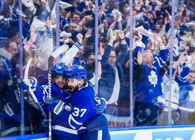 William Nylander #88 of the Toronto Maple Leafs celebrates his goal against the Boston Bruins with teammate Timothy Liljegren #37 during the second period in Game Six of the First Round of the 2024 Stanley Cup Playoffs