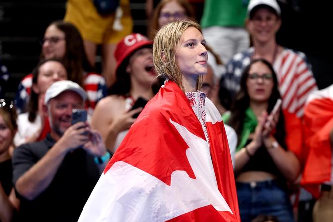 Team Canada swimmers cheering