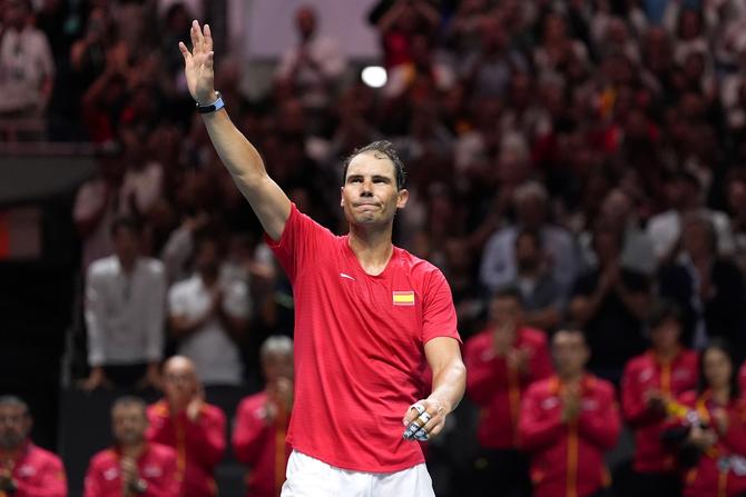 Rafael Nadal of Team Spain waves to the fans after losing his singles match against Botic van de Zandschulp of Team Netherlands.