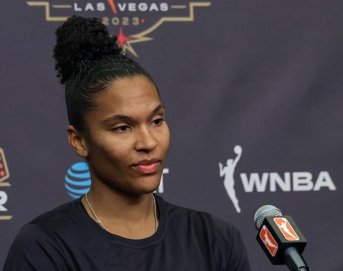 The Connecticut Sun’s Alyssa Thomas listens during media availability.