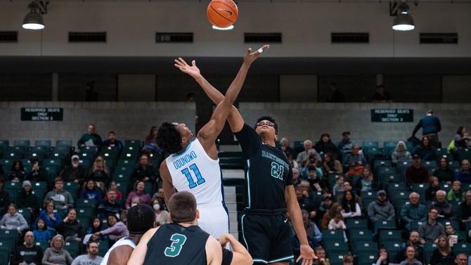 Dartmouth men’s basketball forward Brandon Mitchell-Day tips off.