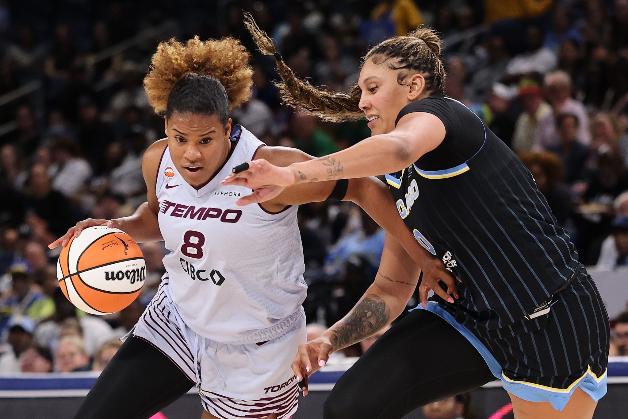 The Toronto Tempo’s Nyara Sabally drives to the basket against the Chicago Sky’s Kamilla Cardoso.