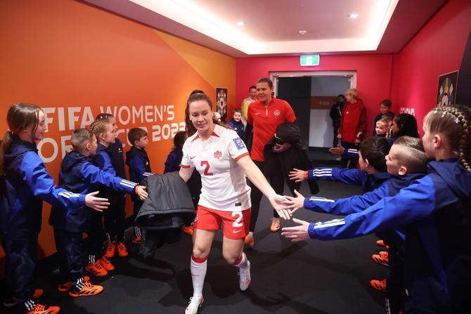 Allysha Chapman of Canada high fives with mascots in the tunnel prior to a FIFA Women's World Cup 2023 group match.