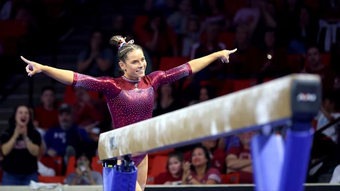 Oklahoma women’s gymnastics junior Jordan Bowers sticks it off the beam.
