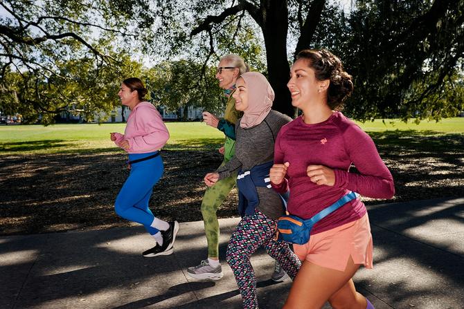 Women running at Forsyth Park