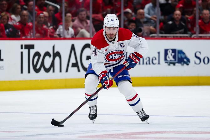 An image of a hockey player on the ice