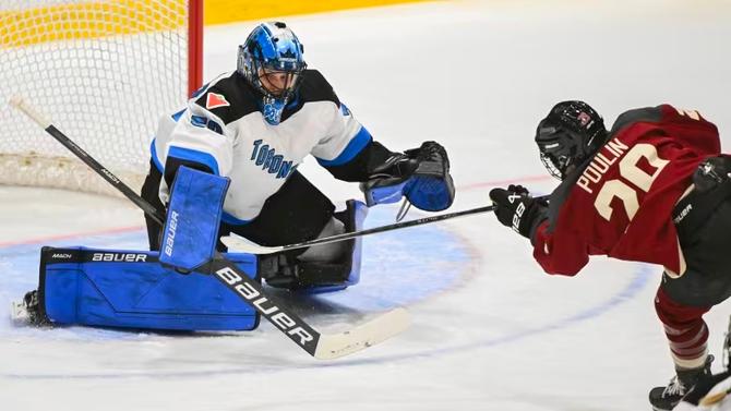 Montreal's Marie-Philip Poulin scores against Toronto goaltender Kristen Campbell during a game in January.