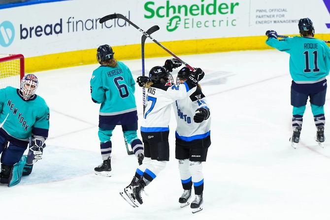PWHL Toronto forward Emma Maltais celebrates after scoring on PWHL New York.