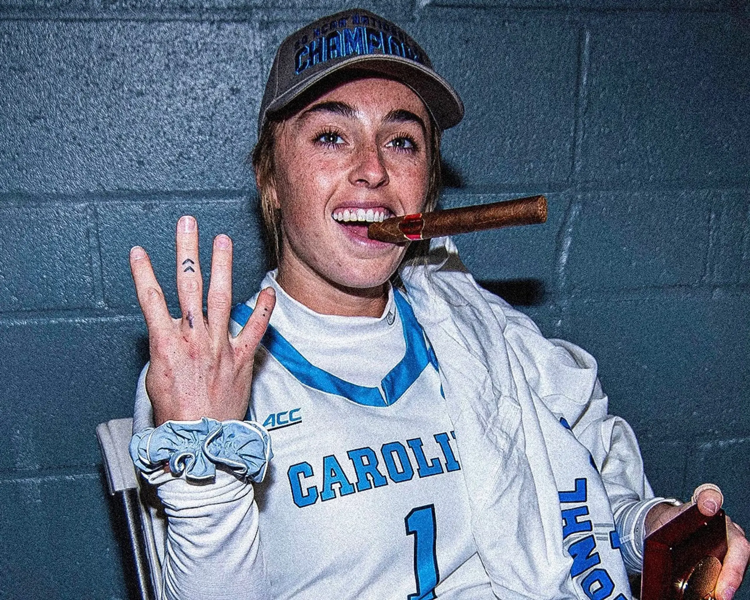 Erin Matson celebrates her fourth national championship as a player with UNC field hockey.