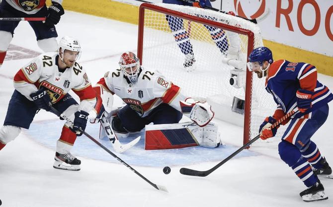 The Florida Panthers defend a shot from the Edmonton Oilers’ Zach Hyman.