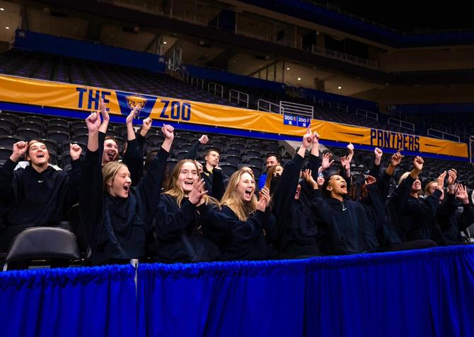 The Pitt volleyball team celebrates receiving the No. 1 overall seed for the NCAA Tournament.