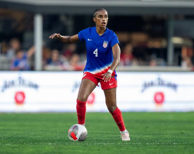 Naomi Girma of the United States dribbles.