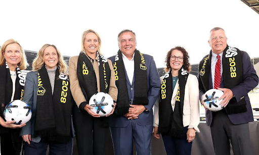 NWSL commissioner Jessica Berman poses with NWSL Columbus ownership group.