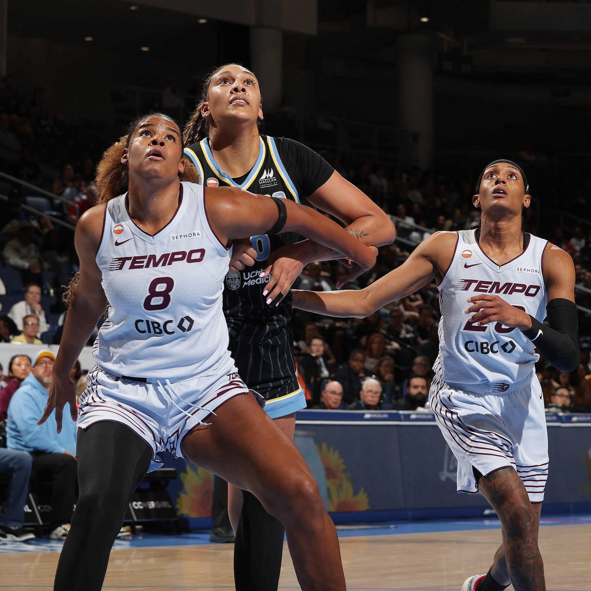 Nyara Sabally of the Toronto Tempo boxes out Kamilla Cardoso of the Chicago Sky. 