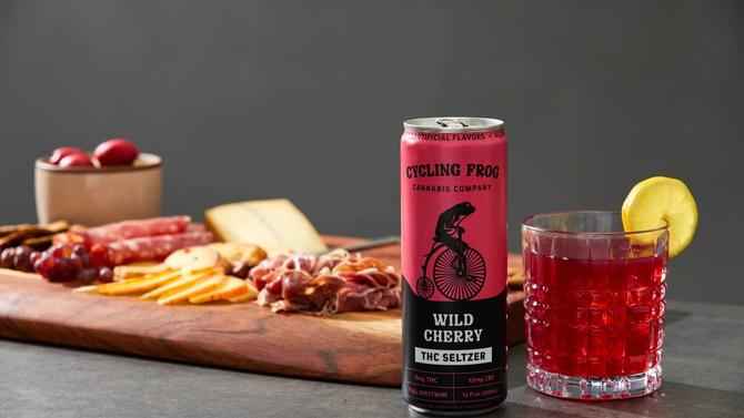 A can of Cycling Frog seltzer next to a charcuterie board