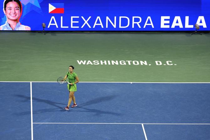 Tennis player Alex Eala walks off the court at the DC Open after beating Elina Svitolina.