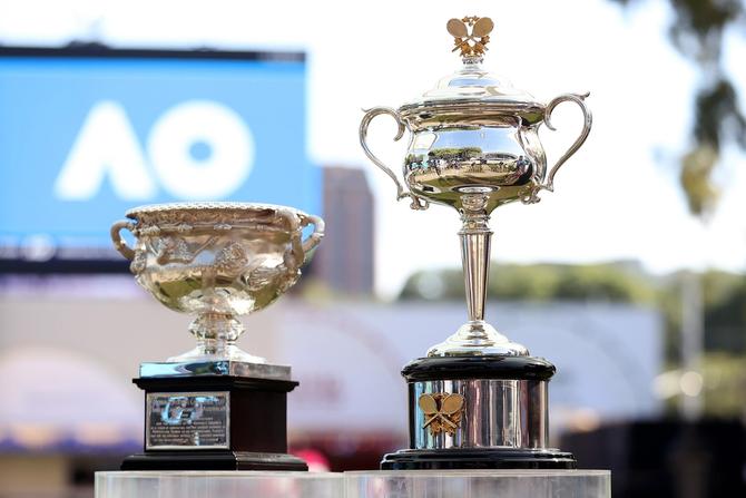 The Norman Brookes Challenge Cup and the Daphne Akhurst Memorial Cup on display ahead of the 2025 Australian Open