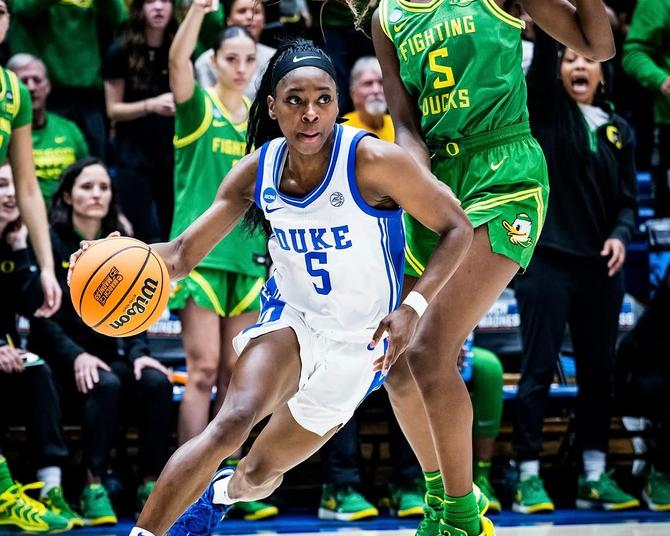 Duke sophomore guard Oluchi Okananwa dribbles the ball past an Oregon defender in second-round action.