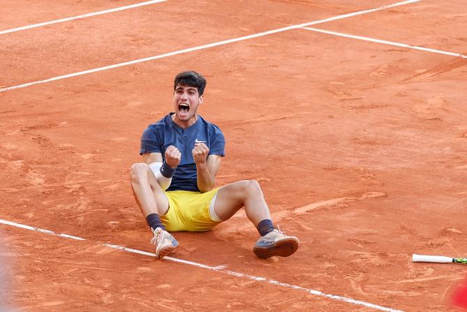 Carlos Alcaraz reacts after winning the 2024 French Open