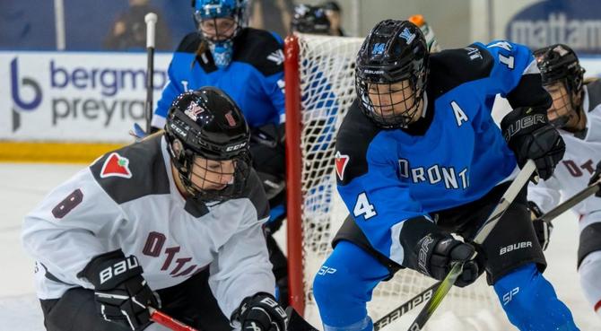 Ottawa and Toronto fighting for the puck