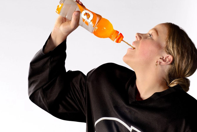 Sarah Fillier drinking an orange Gatorade