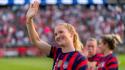 USWNT midfielder Sam Mewis waves to the crowd. 