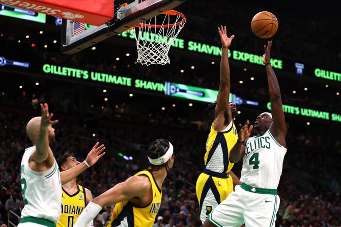 Jrue Holiday of the Boston Celtics shoots the ball.