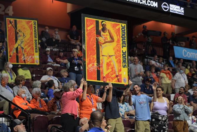 A general view of a Connecticut Sun forward Jonquel Jones oversized trading card to raise awareness for 2022 WNBA All-Star Game voting, during the WNBA game between the Indiana Fever and the Connecticut Sun on June 8, 2022, at Mohegan Sun Arena in Uncasville, CT.