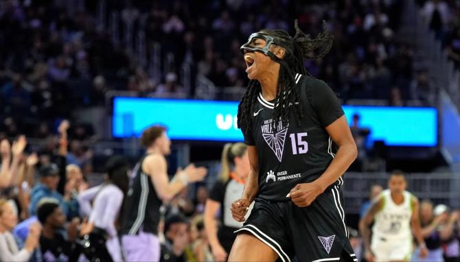 Golden State Valkyries Tiffany Hayes reacts after scoring a bucket.