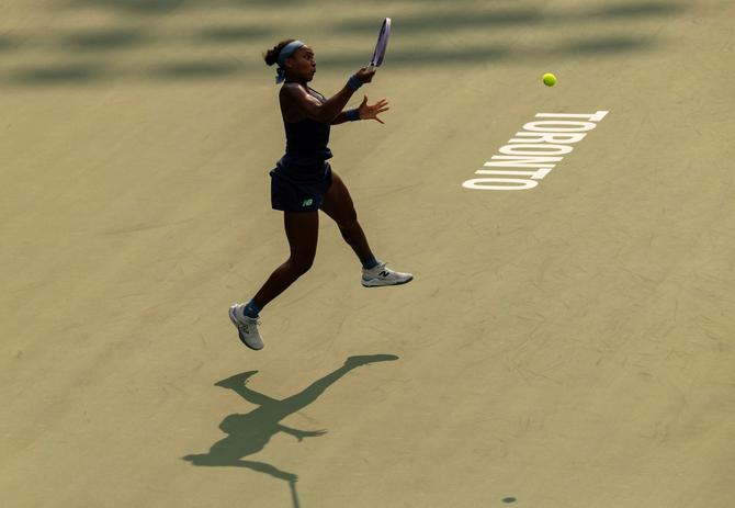 Coco Gauff of the United States returns the ball during the women's singles round of 16 match.