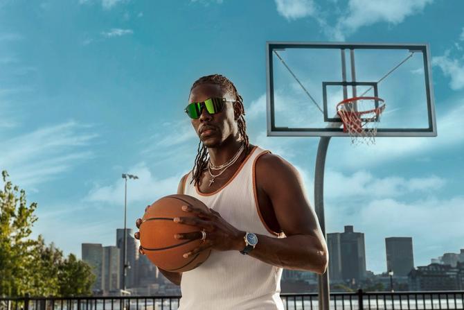 Jrue Holiday holding a basketball