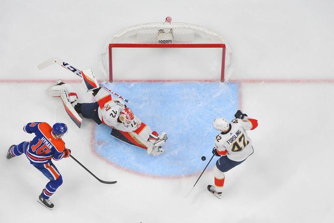 Sergei Bobrovsky of the Florida Panthers makes a save against Zach Hyman of the Edmonton Oilers during the game at Rogers Place on December 16.