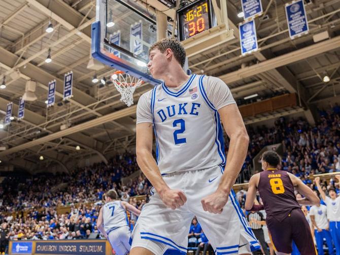 Duke men’s basketball star Cooper Flagg flexes for the camera.