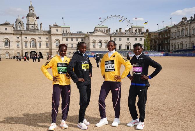 Kenya's Peres Jepchirchir, Kenya's Brigid Kosgei, Ethiopia's Tigst Assefa and Kenya's Ruth Chepngetich pose ahead of the London Marathon
