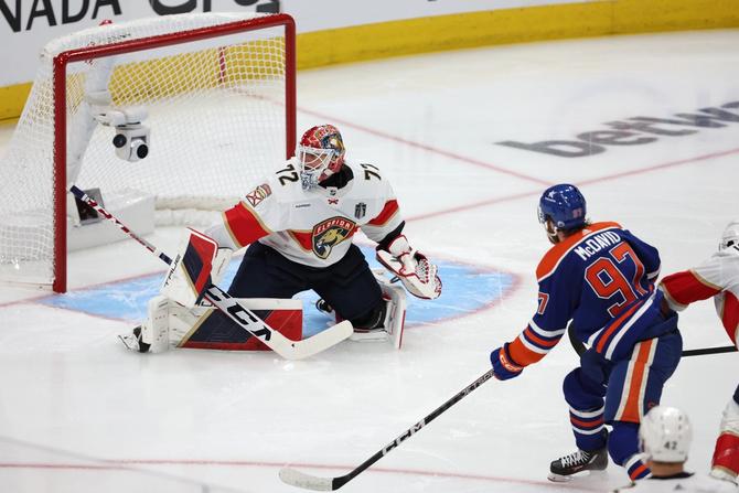Connor McDavid #97 of the Edmonton Oilers scores a goal past Sergei Bobrovsky #72 of the Florida Panthers