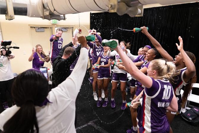 The TCU women’s basketball team celebrates after an upset win over Notre Dame