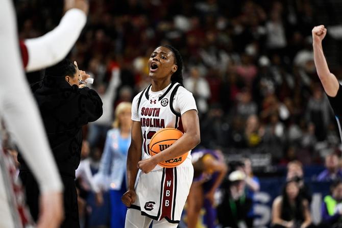 MiLaysia Fulwiley #12 of the South Carolina Gamecocks celebrates getting fouled against the LSU Lady Tigers in the fourth quarter during the championship game of the SEC Women's Basketball Tournament at Bon Secours Wellness Arena on March 10, 2024 in Greenville, South Carolina.