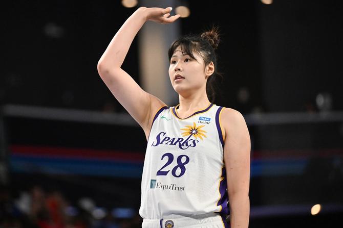 Li Yueru #28 of the Los Angeles Sparks looks on against the Atlanta Dream on June 16, 2024 at Gateway Center Arena at College Park in Atlanta, Georgia.