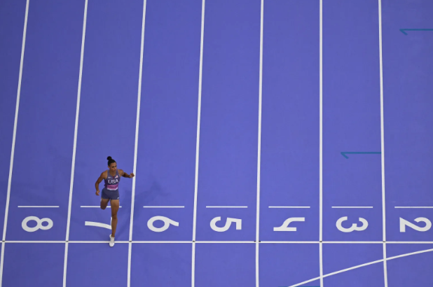 Sydney McLaughlin-Levrone crosses the finish line.