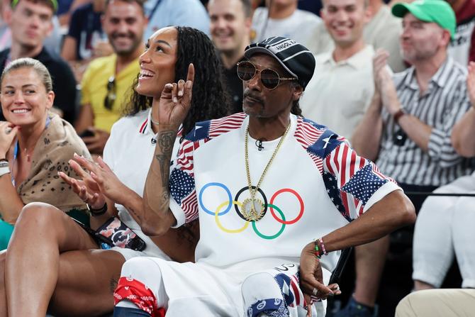 A'Ja Wilson, Team United States basketball player, and Snoop Dogg attend the Men's Quarterfinal match between Team Brazil and Team USA on day eleven of the Olympic Games Paris 2024 at Bercy Arena on August 6, 2024 in Paris, France.