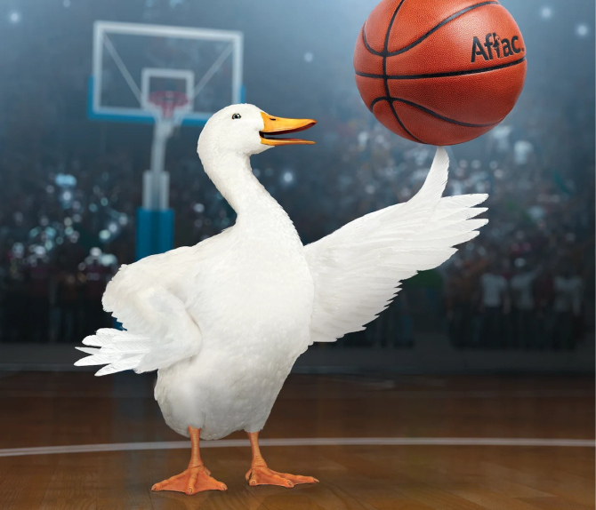 The Aflac duck spinning a basketball on its feather