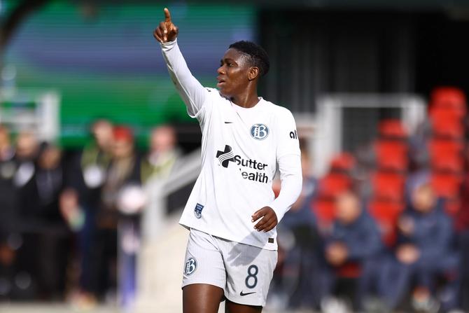 Asisat Oshoala #8 of Bay FC reacts against Washington Spirit during a NWSL 2024 Playoff game at Audi Field on November 10, 2024 in Washington, DC.