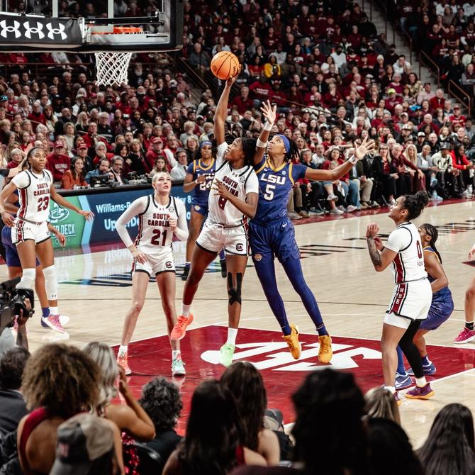 South Carolina’s Joyce Edwards shoots while LSU’s Sa’Myah Smith defends.