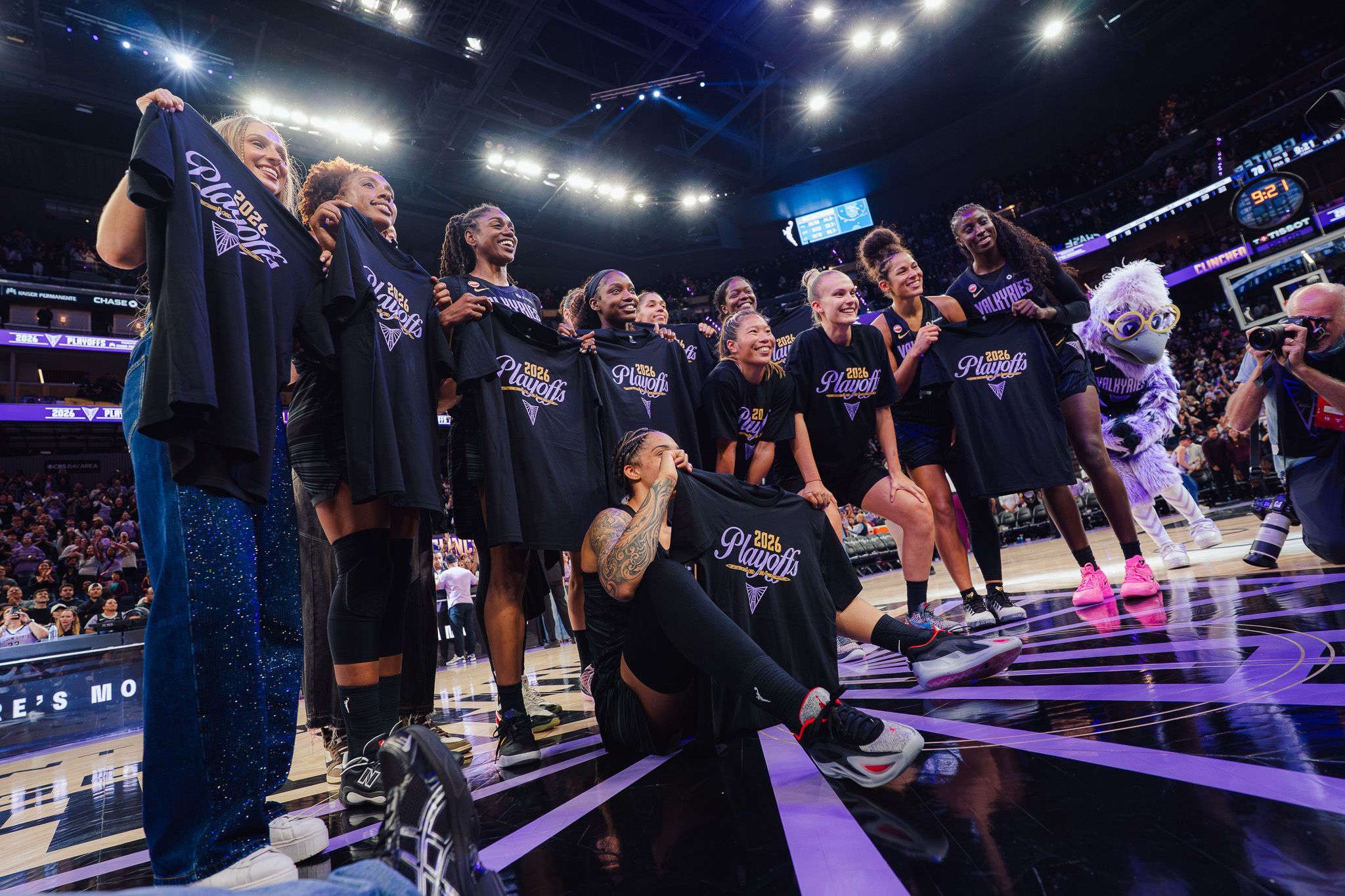 The Golden State Valkyries celebrate a playoff clinch with custom t shirts on home court.