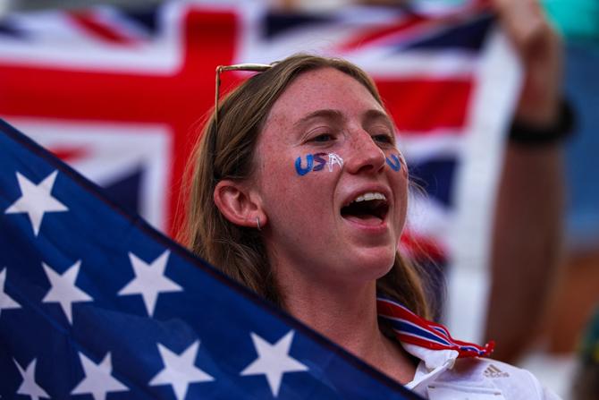 A fan cheers for the US team before the start of the women's group B football match between Australia and the USA during the Paris 2024 Olympic Games at the Marseille Stadium in Marseille on July 31, 2024.