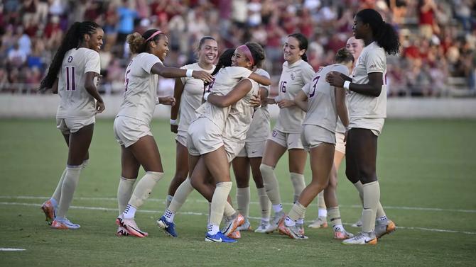 The Florida State women’s soccer team celebrates a win over Clemson.
