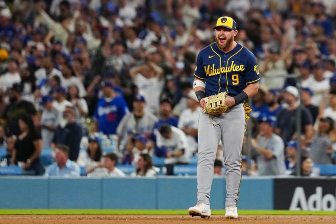Jake Bauers of the Milwaukee Brewers celebrates after the Brewers advance to the World Series.