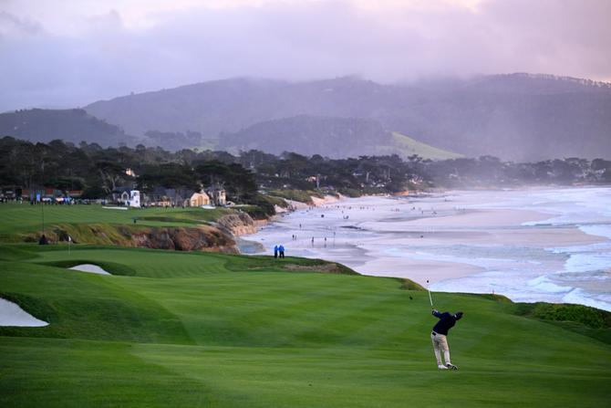 Peter Malnati of the United States plays a shot on the ninth hole during the final round of the AT&T Pebble Beach Pro-Am at Pebble Beach Golf Links