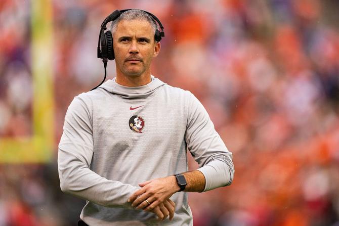 Florida State football head coach Mike Norvell on the sidelines during a game.